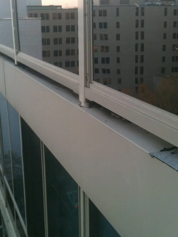 Slide of DHI Roofing Contractor