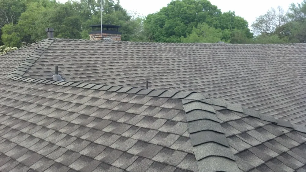 Slide of Dial One Collin Creek Roof Service