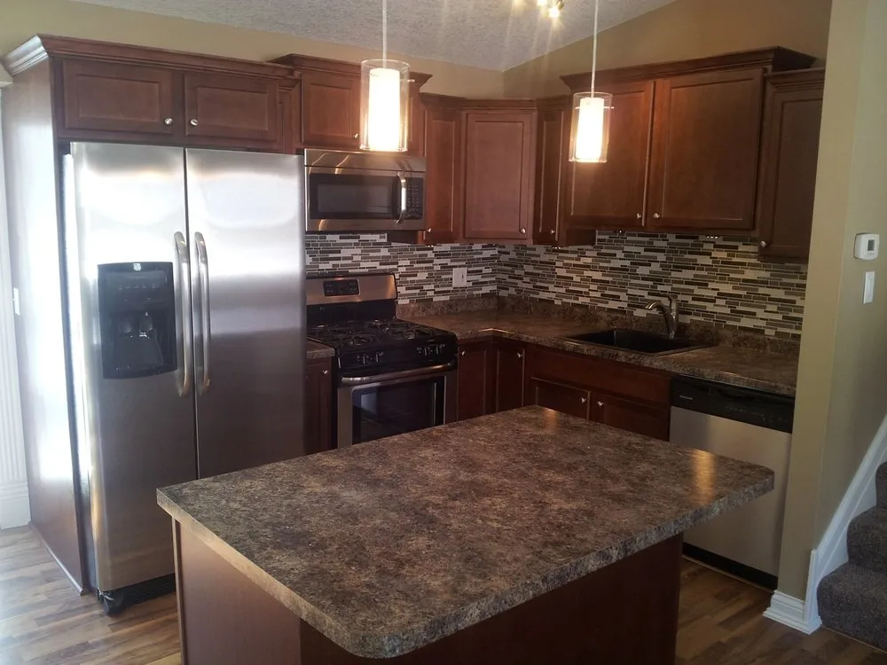 Slide of Diamond Roofing, Remodeling & Roof Shampoo