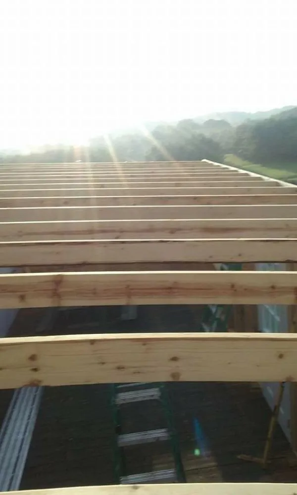 Slide of Dickens Roofing