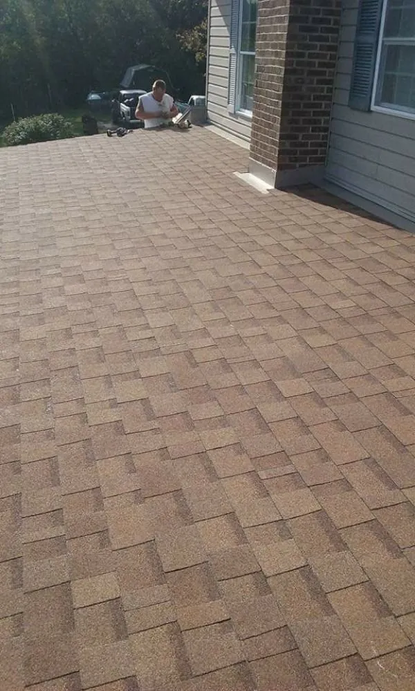 Slide of Dickens Roofing