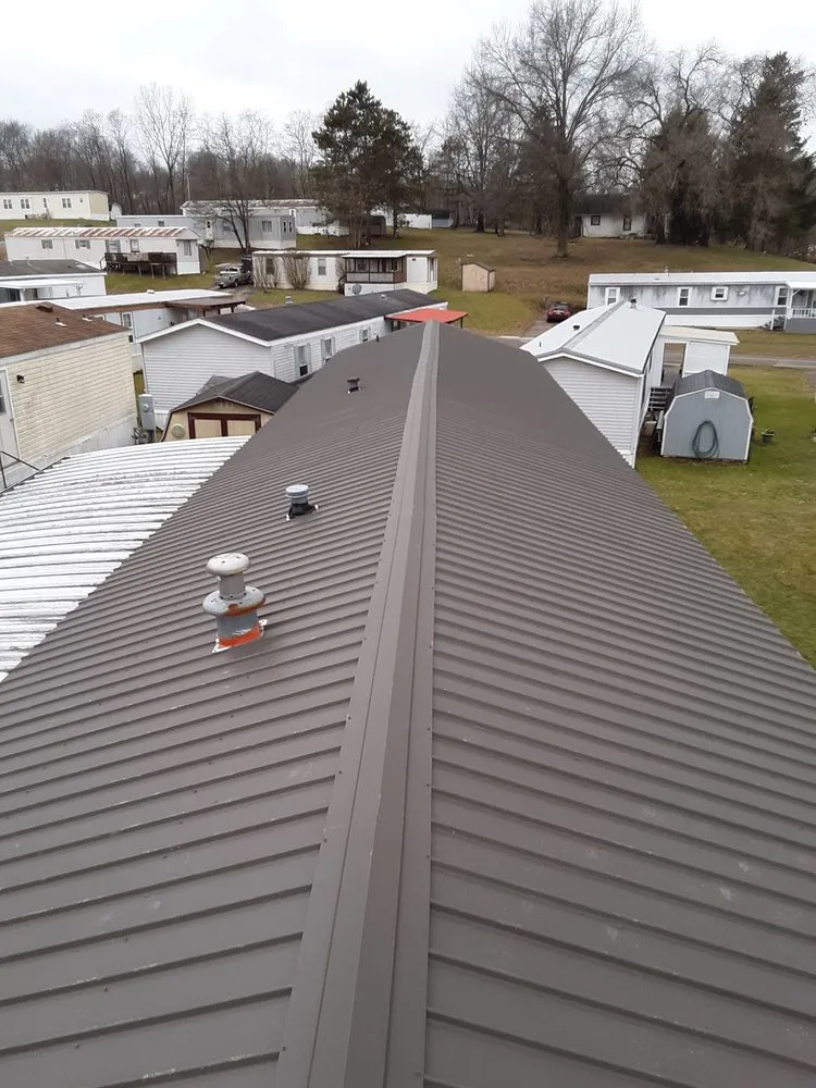 Slide of Dickens Roofing