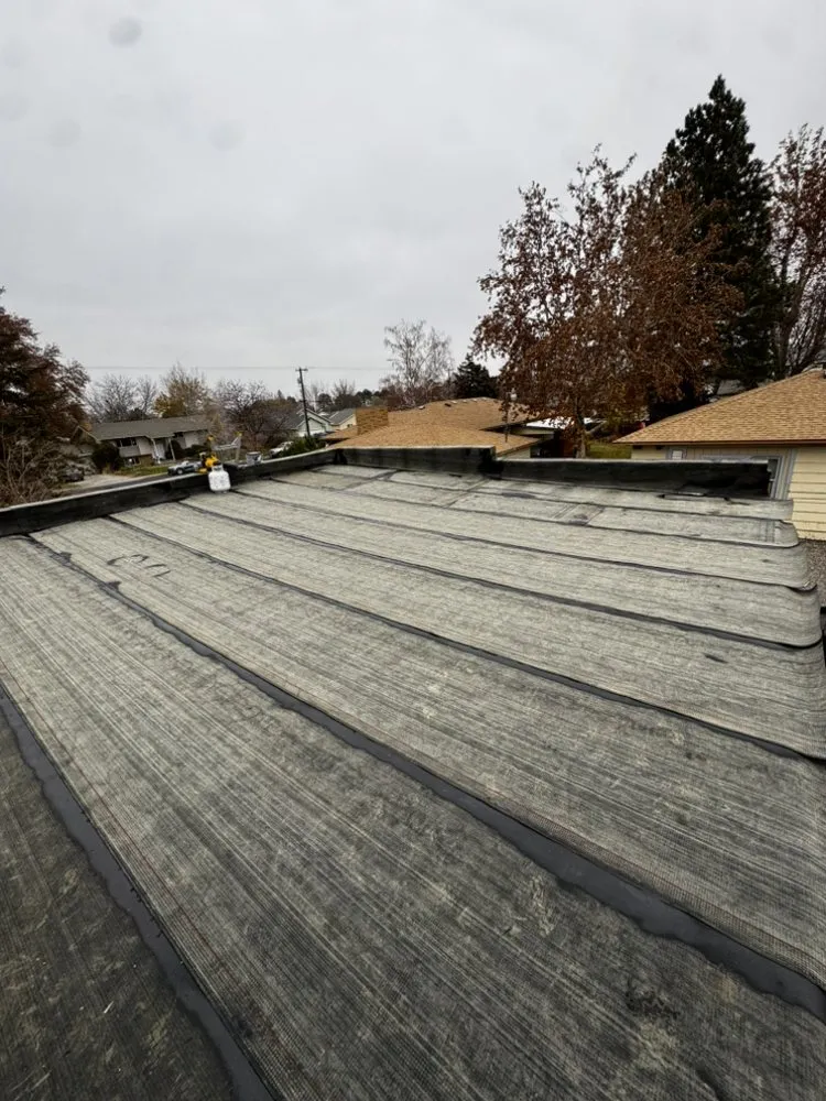 Slide of Dicks Roofing