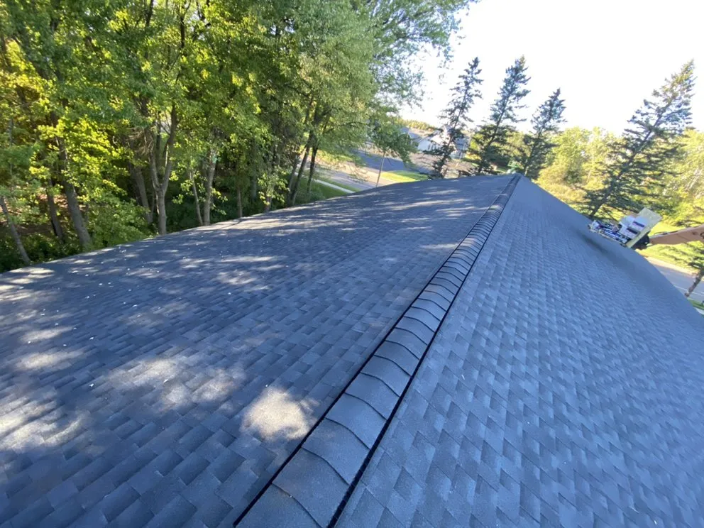 Local flat roof repair after storm damage in Brook Park, MN by Digger