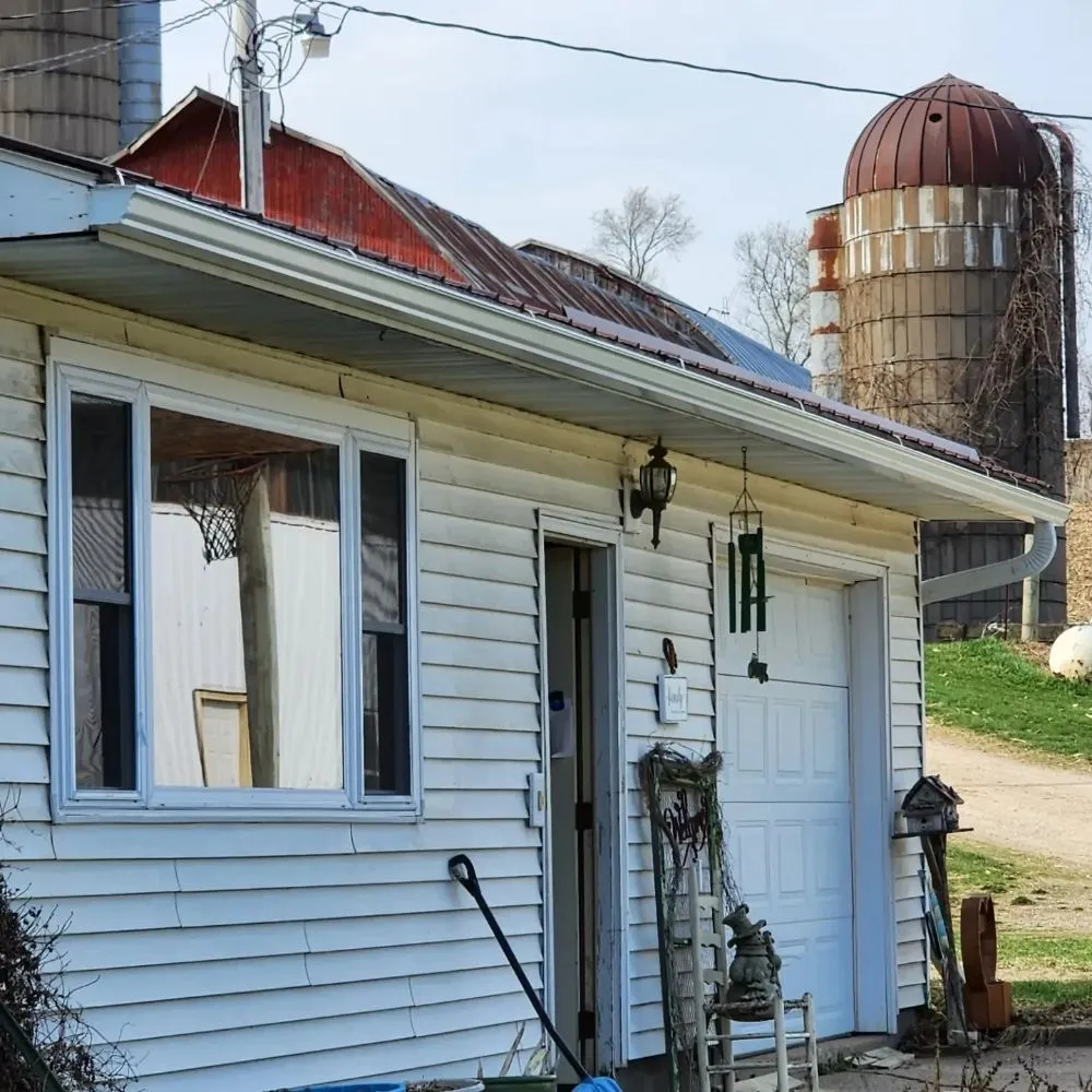 Slide of Dillon's Seamless Gutters and Roof Solutions