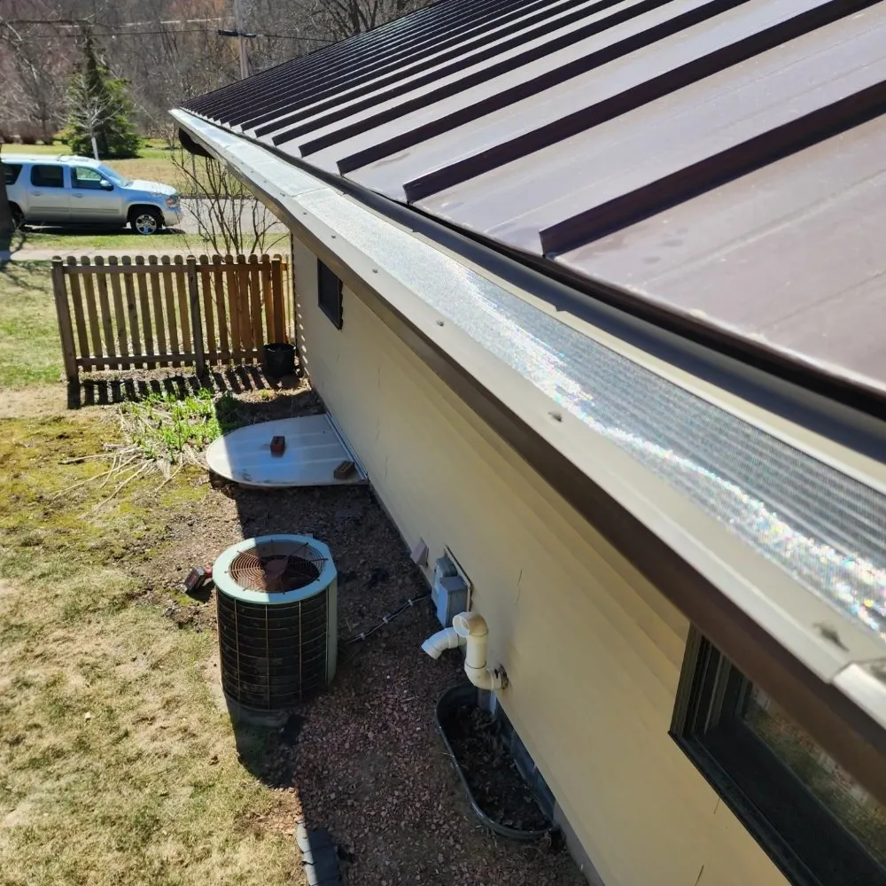 Slide of Dillon's Seamless Gutters and Roof Solutions