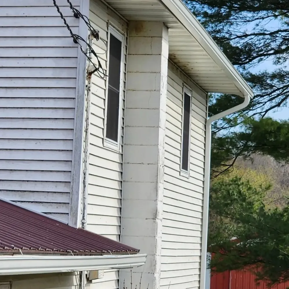 Slide of Dillon's Seamless Gutters and Roof Solutions