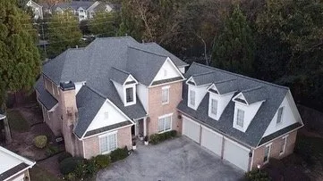 Slide of DIM Construction and Roofing