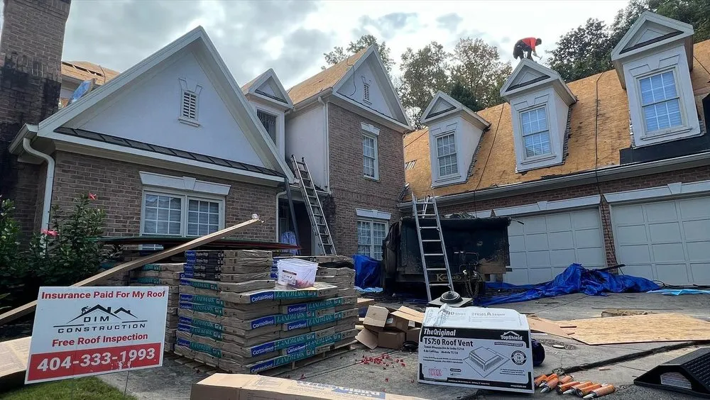 Slide of DIM Construction and Roofing