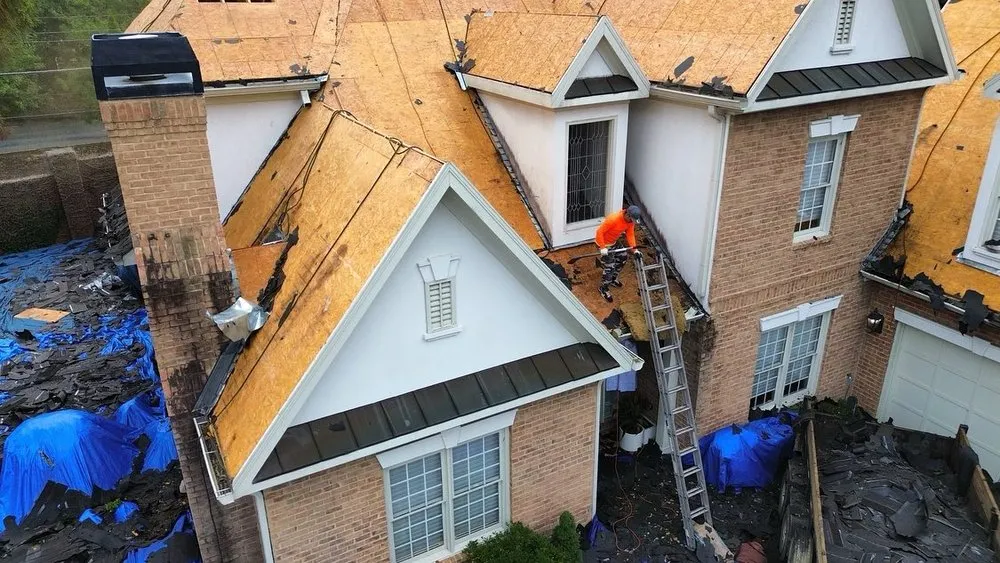 Slide of DIM Construction and Roofing