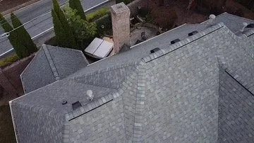 Slide of DIM Construction and Roofing