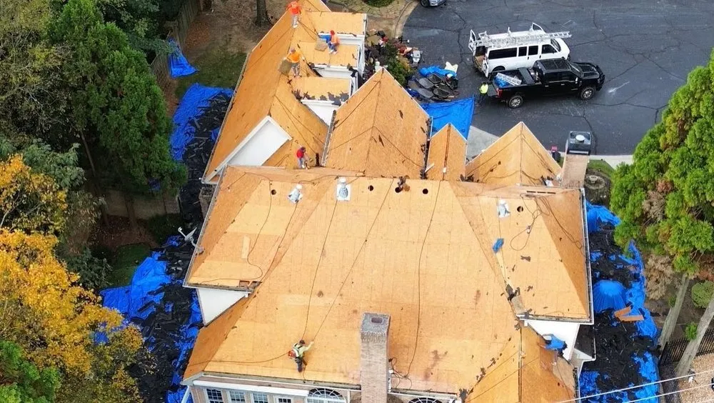 Slide of DIM Construction and Roofing