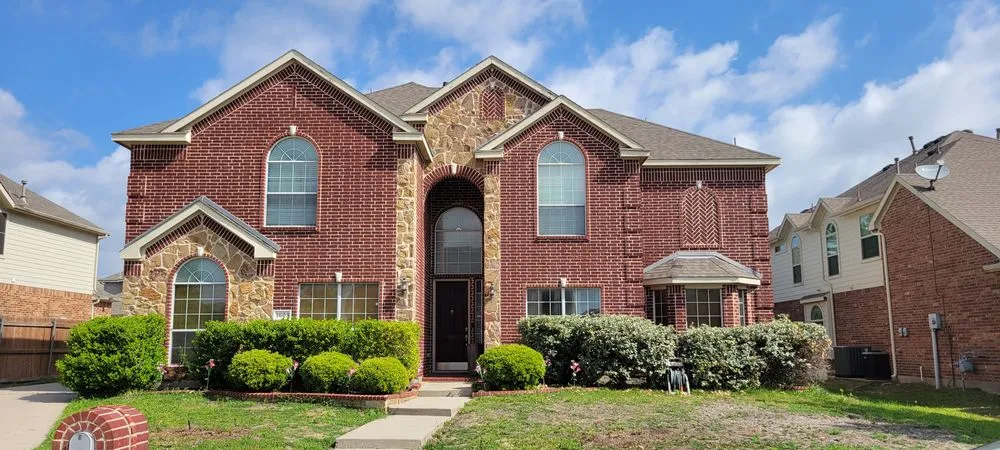 Slide of Dinger Roofing