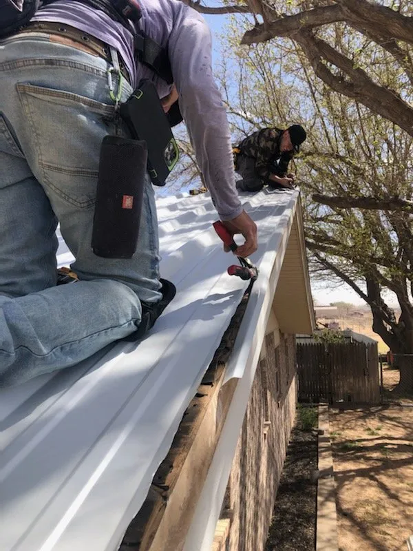 Slide of Dinger Roofing