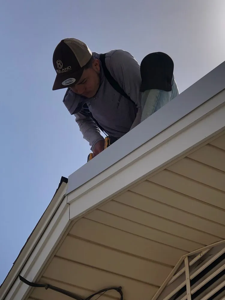 Slide of Dinger Roofing