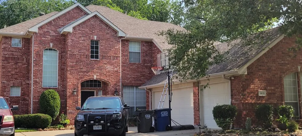 Slide of Dinger Roofing