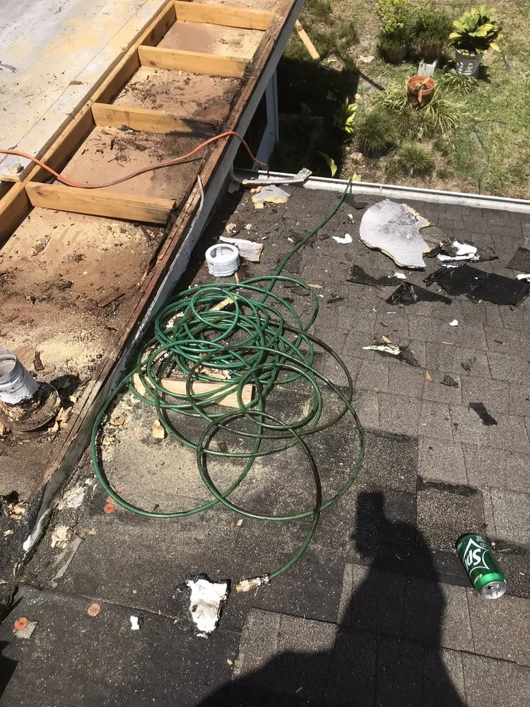 Slide of Dino Roofing Services