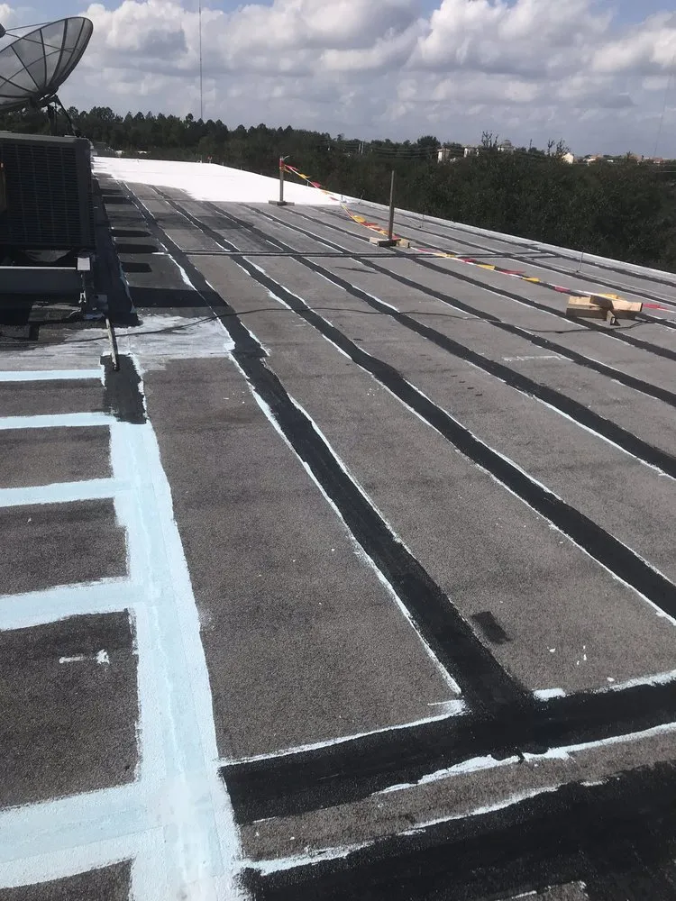 Slide of Dino Roofing Services