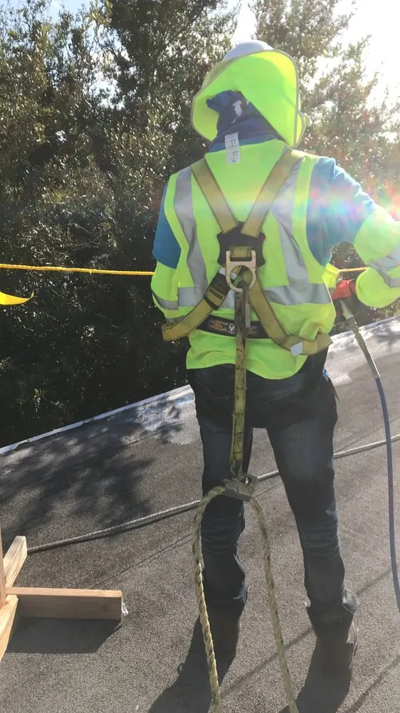 Slide of Dino Roofing Services