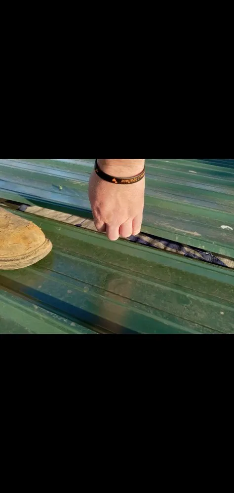 Slide of Dino's Home Repair