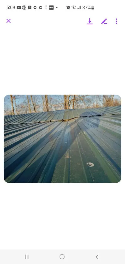 Slide of Dino's Home Repair