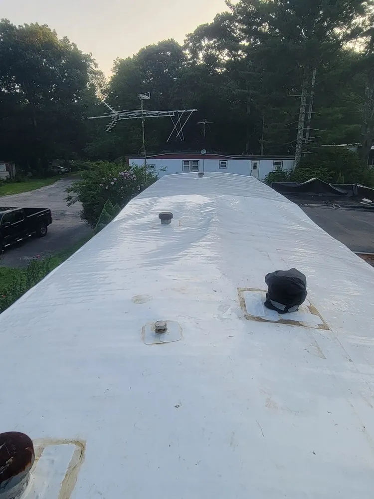 Slide of DiRoma Roofing