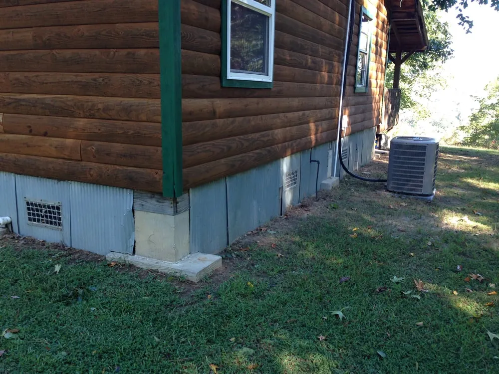 Local storm damage roof repair for residential properties in Bismarck, AR by Discount Developers