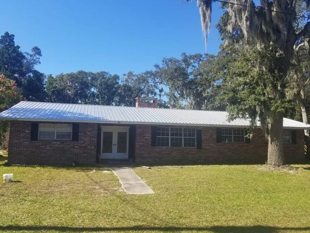 Local roof replacement after storm damage in St. Augustine, FL by Discount Roofing of St Augustine