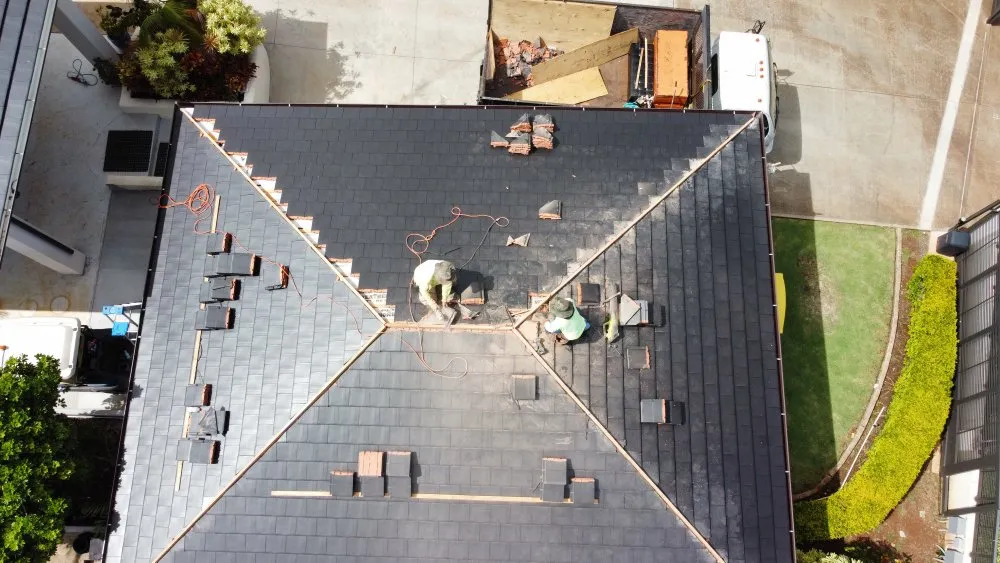 Slide of Discovery Roofing