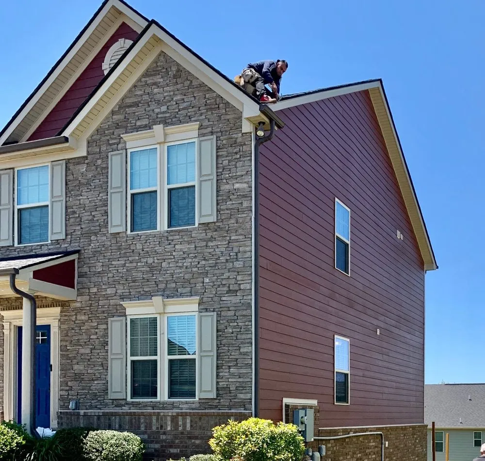 Slide of Distinctive Roofing