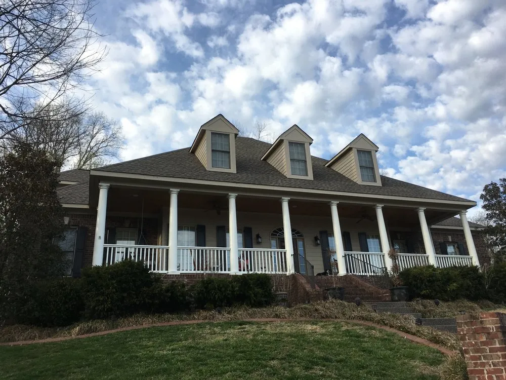 Slide of Distinctive Roofing