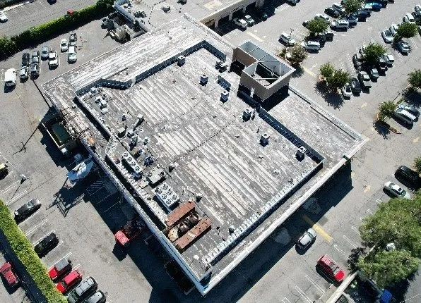 Slide of DK Commercial Roofing