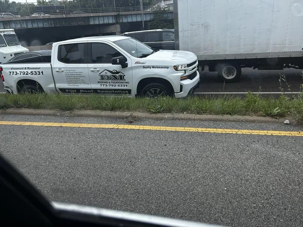 Slide of D&M Roofing & Tuckpointing