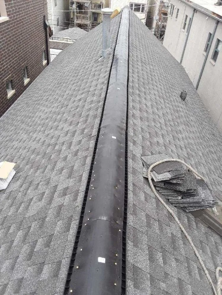 Slide of D&M Roofing & Tuckpointing
