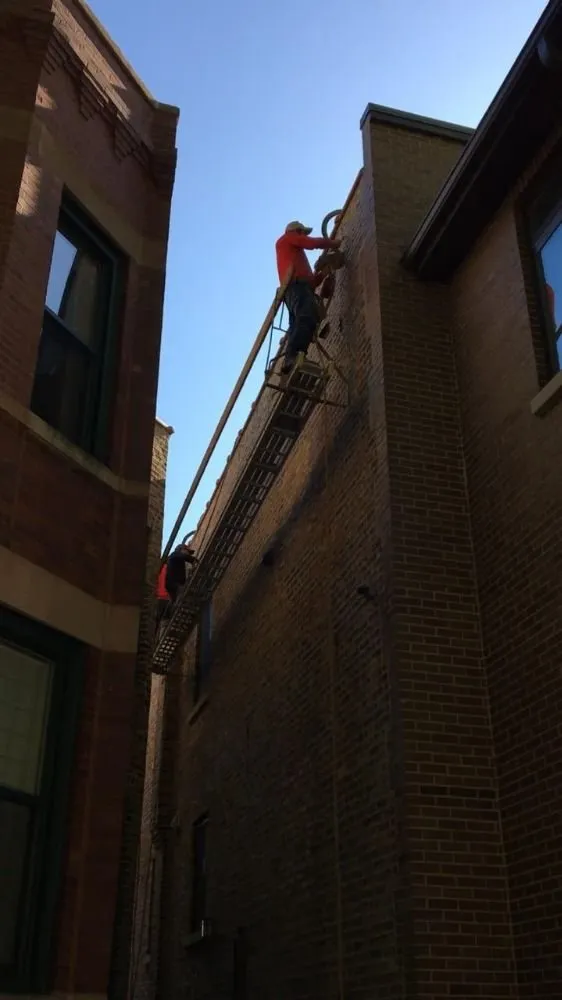 Slide of D&M Roofing & Tuckpointing