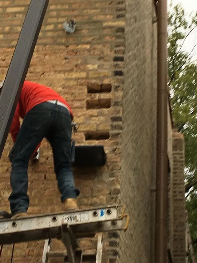 Slide of D&M Roofing & Tuckpointing