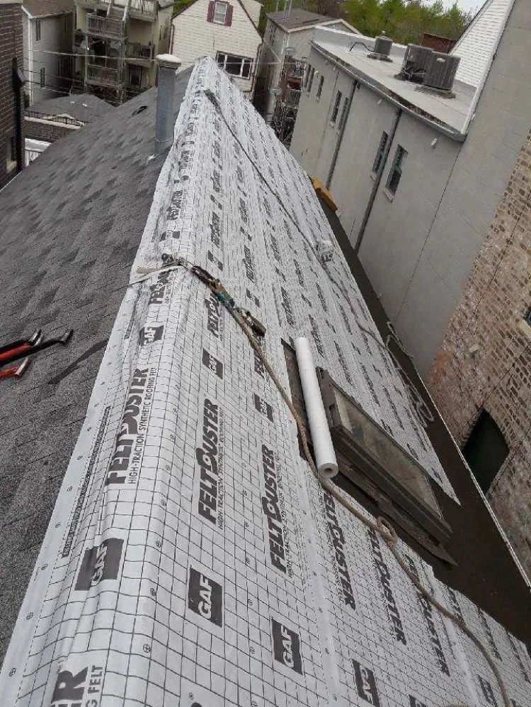 Slide of D&M Roofing & Tuckpointing