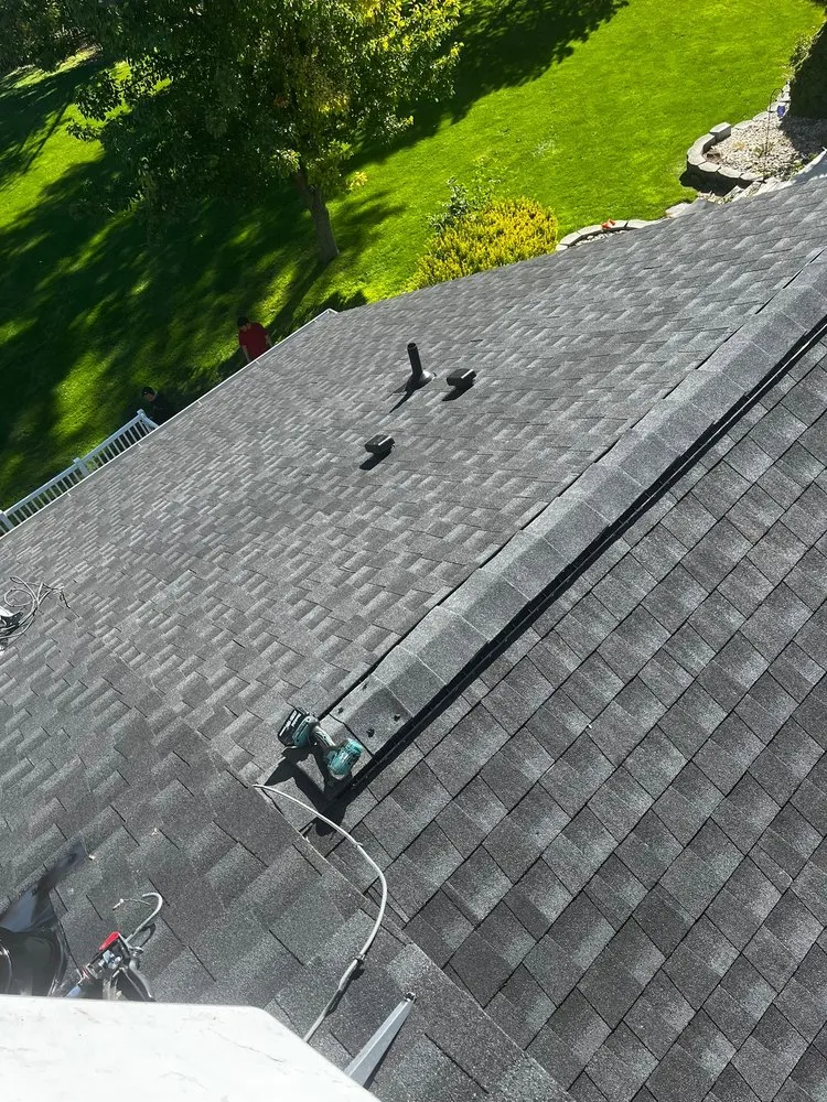 Slide of D&M Roofing