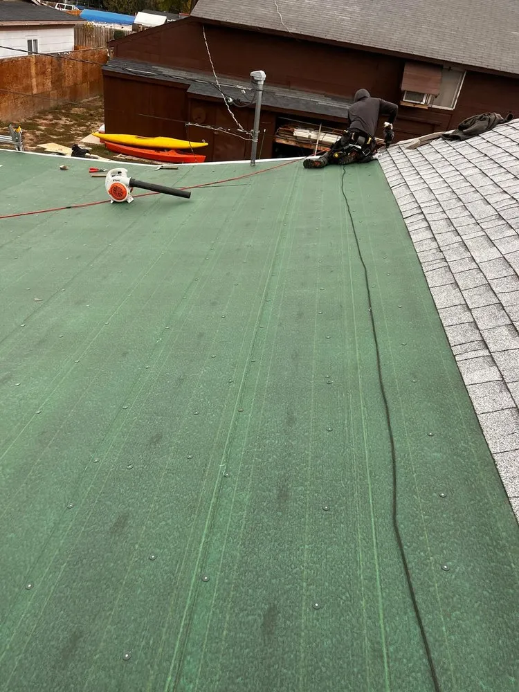 Slide of D&M Roofing