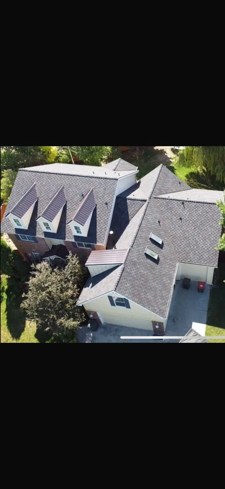 Slide of D&M Roofing