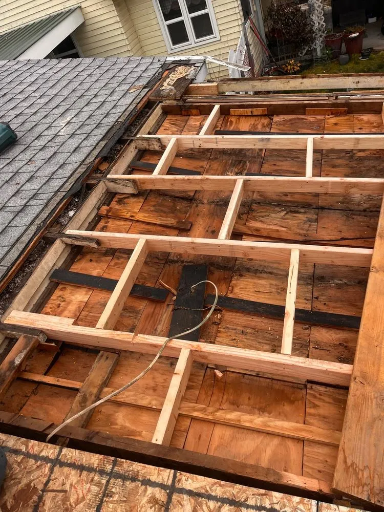 Slide of D&M Roofing