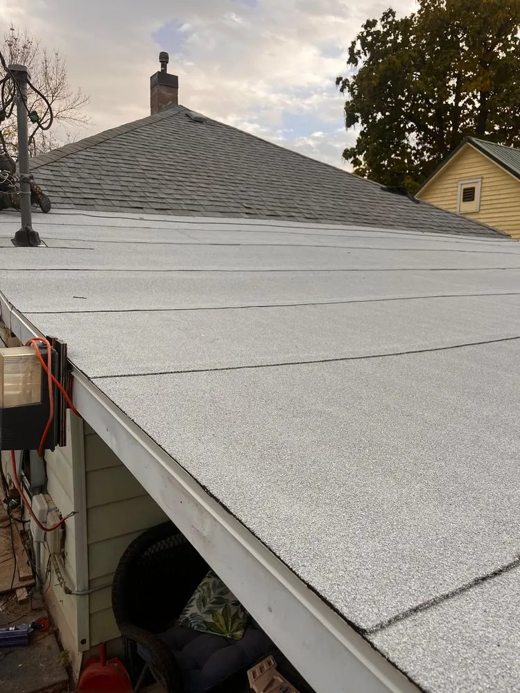 Slide of D&M Roofing