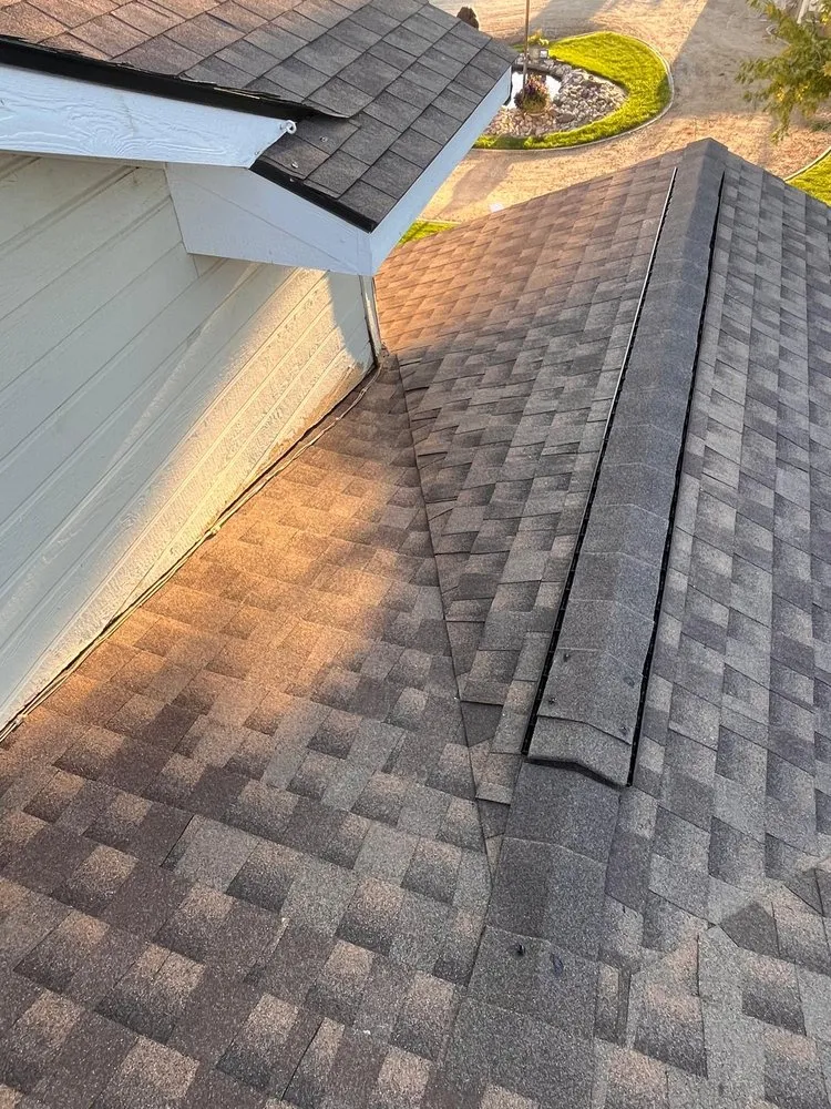 Slide of D&M Roofing