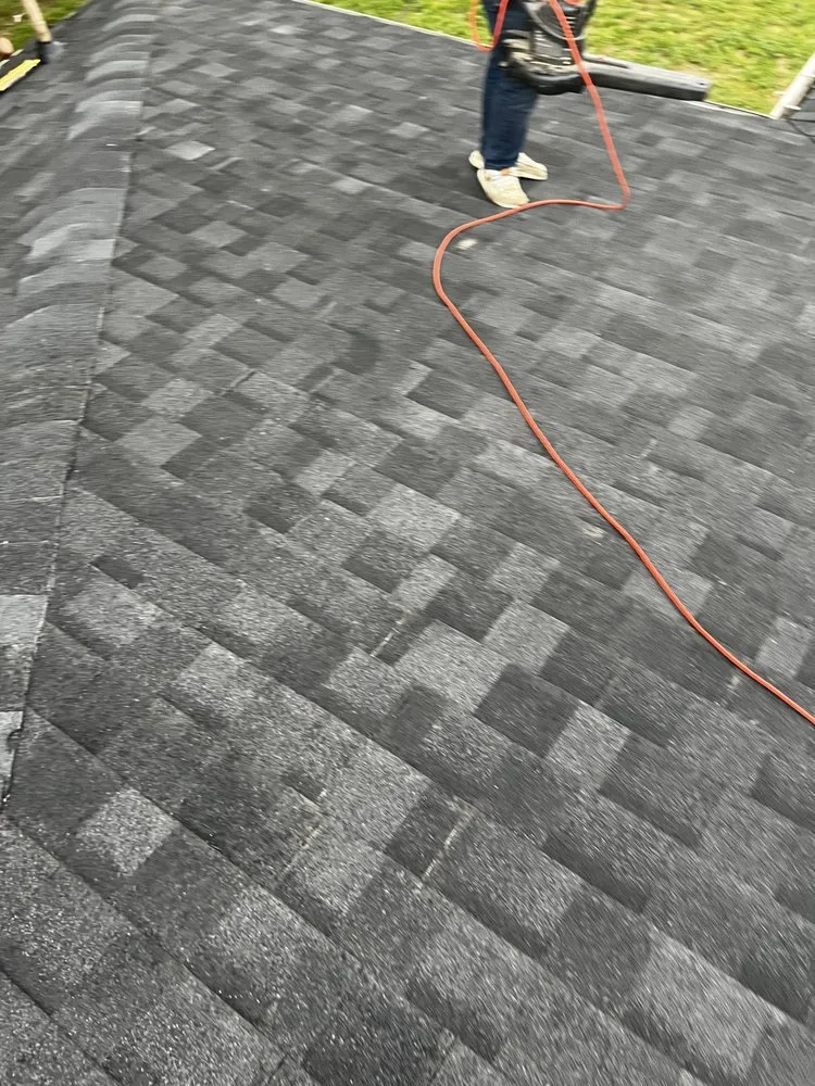 Slide of D&M Roofing