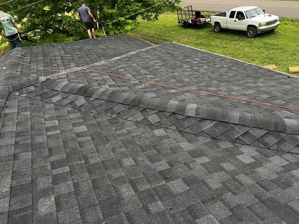 Slide of D&M Roofing