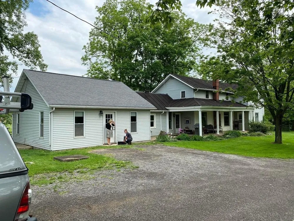 Slide of DM Roofing Siding & Windows