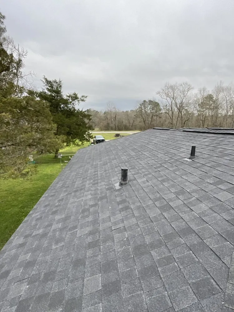 Slide of DMC Roofing