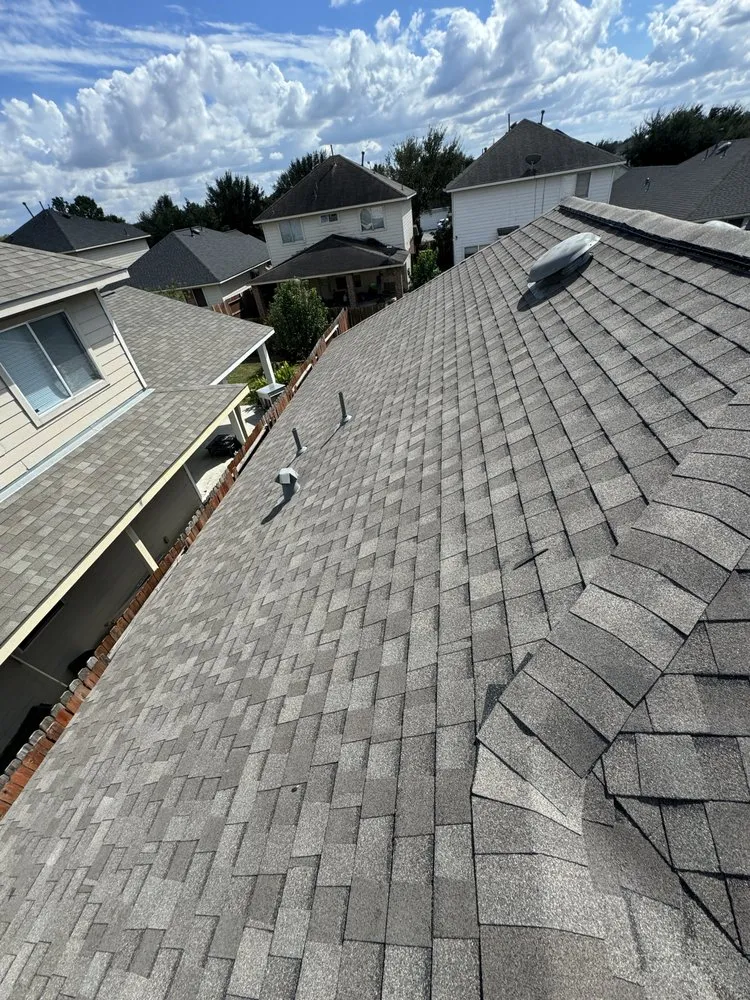 Slide of DMC Roofing