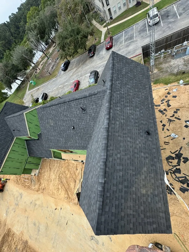 Slide of DMC Roofing