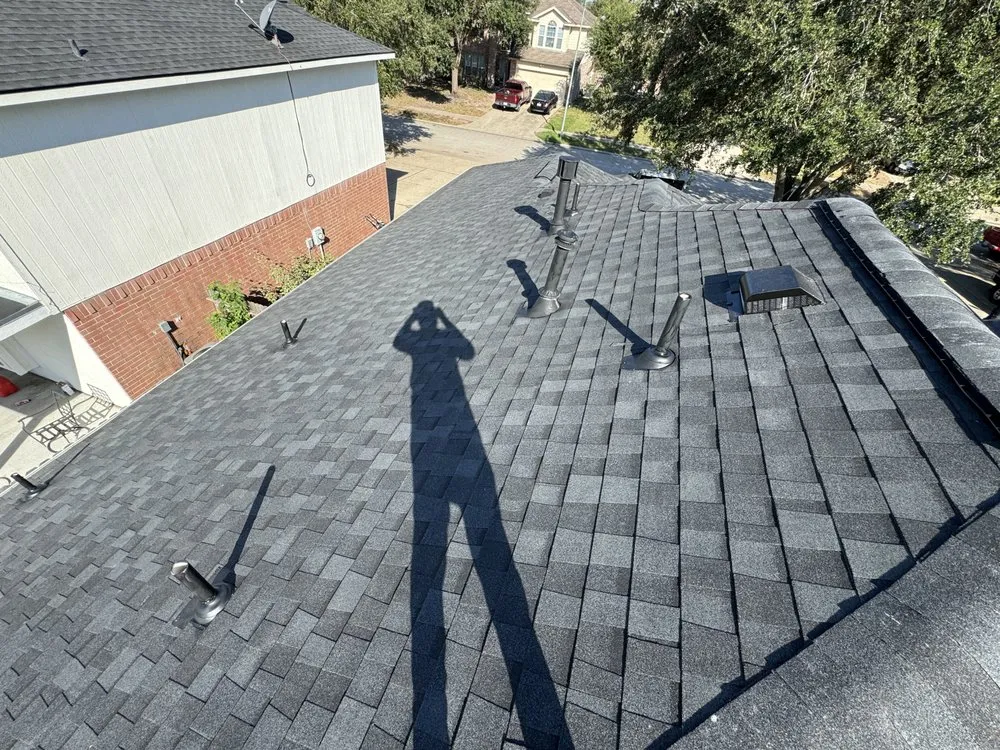 Slide of DMC Roofing